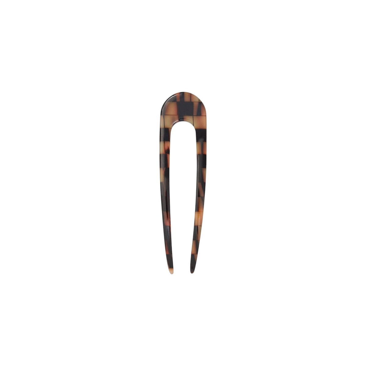 The Tiny Finch French hair pin in a blonde checkerboard pattern, handcrafted from polished Italian acetate.