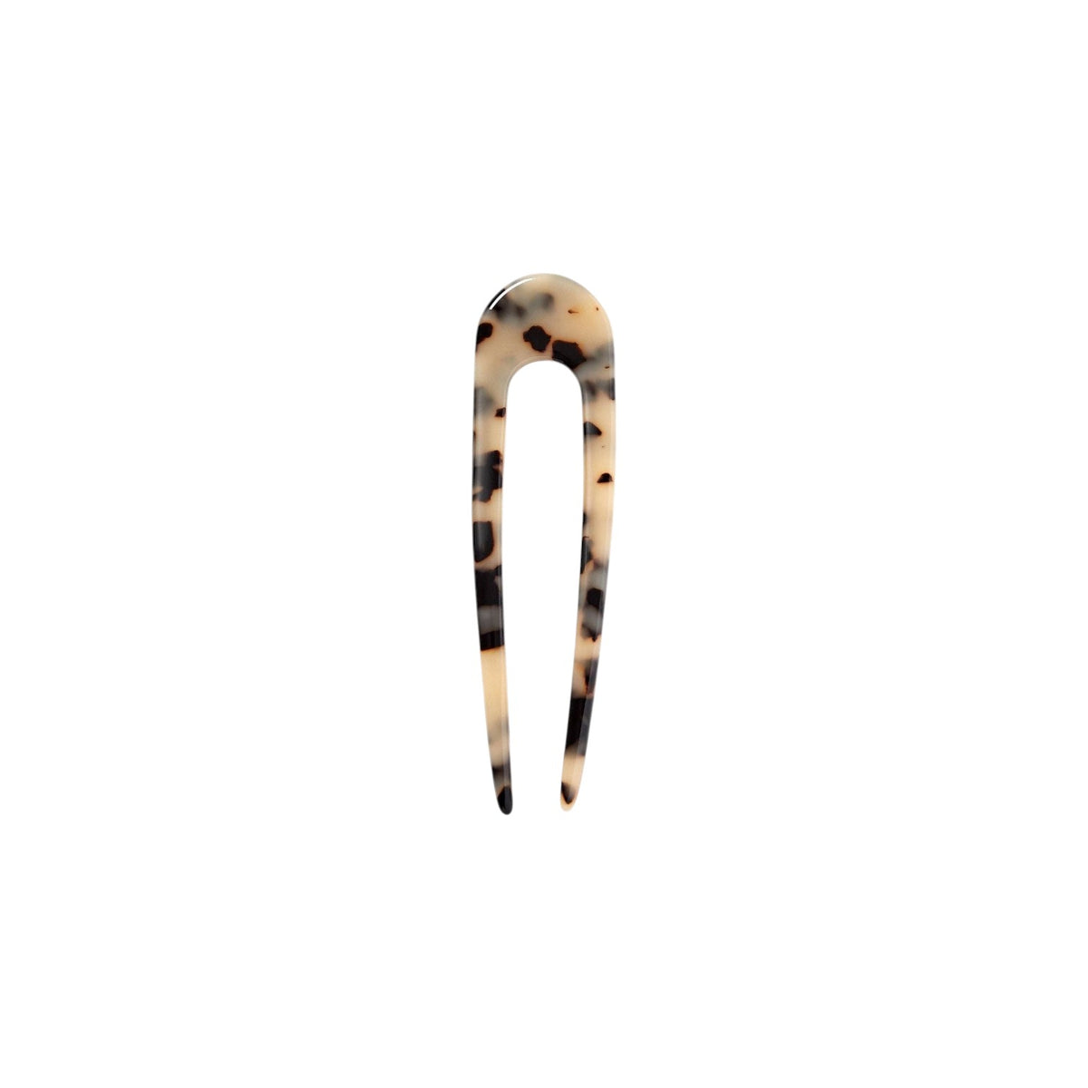 The Tiny Finch French hair pin in blonde tortoise Italian acetate, a 5-inch handcrafted U-shaped hair accessory.