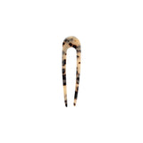 The Tiny Finch French hair pin in blonde tortoise Italian acetate, a 5-inch handcrafted U-shaped hair accessory.
