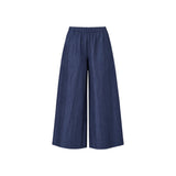 The Tiny Finch Blueberry wide-leg pants in dark blue cotton linen blend with elastic waistband and side pockets.