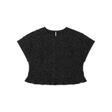 The Tiny Finch Bonn black cropped top in 100% cotton poplin with intricate hand-smocked texture and ruffled hem.