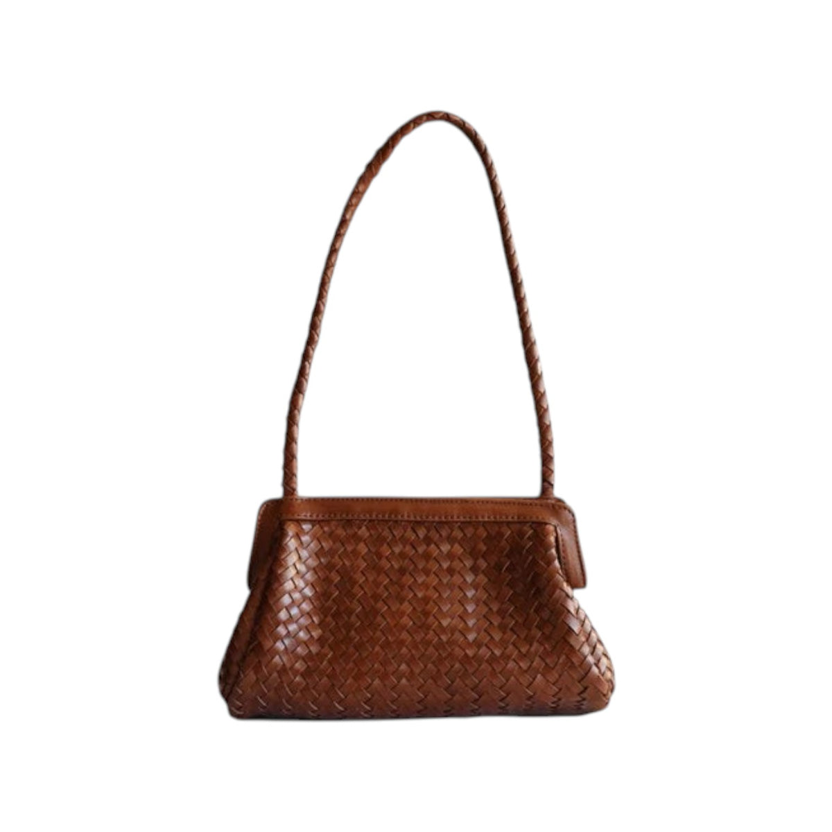 The Tiny Finch Nile Sienna brown woven leather handbag with a braided shoulder strap and structured frame closure.