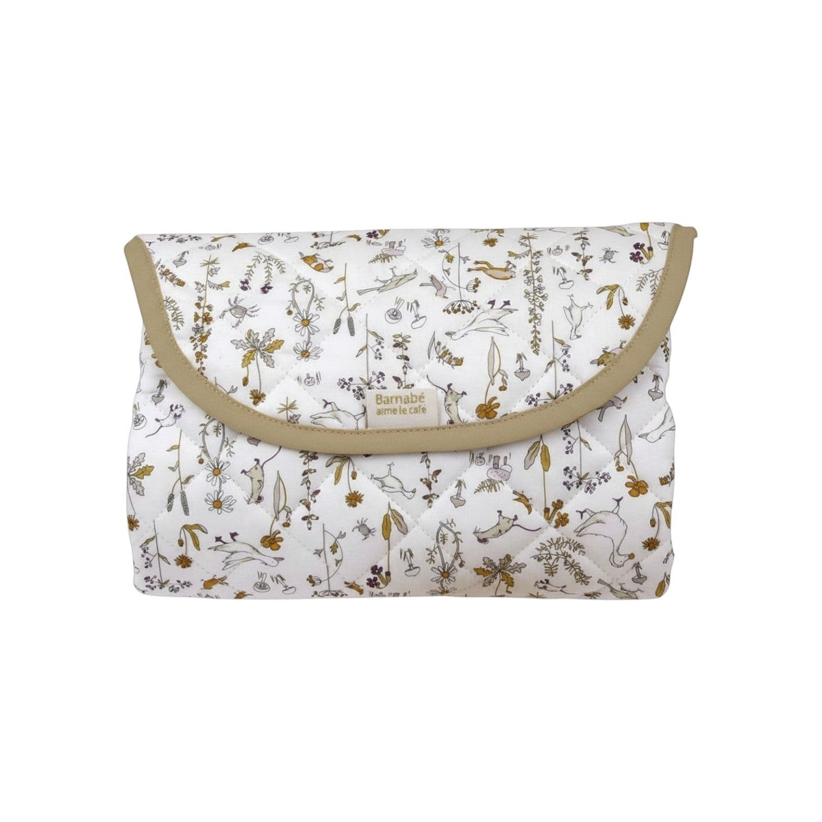 The Tiny Finch Camille travel changing mat in a floral Liberty fleece print, folded into a compact pouch.
