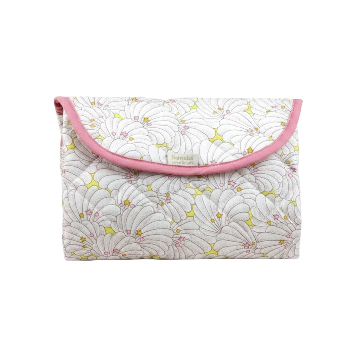 The Tiny Finch Cassandre baby changing mat in a floral Liberty fleece print, folded into a compact pouch.