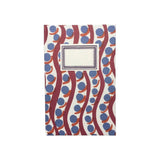 The Tiny Finch hardback notebook featuring a Charleston Scumble pattern with blue circles and red wavy lines.
