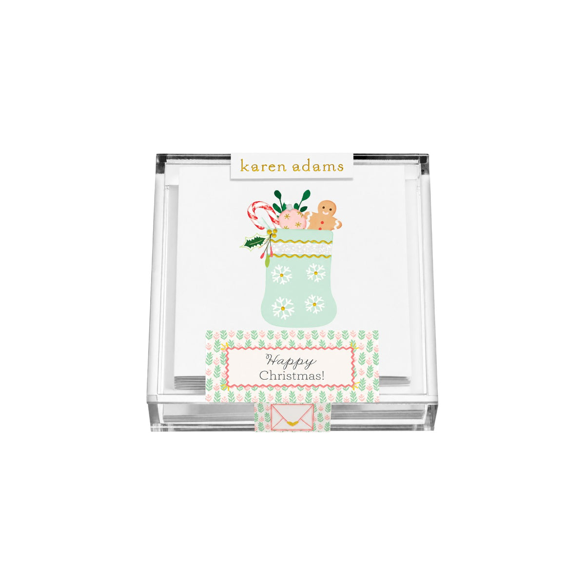 The Tiny Finch hand-glittered Christmas stocking gift enclosure cards in a clear acrylic box with white envelopes.