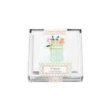 The Tiny Finch hand-glittered Christmas stocking gift enclosure cards in a clear acrylic box with white envelopes.