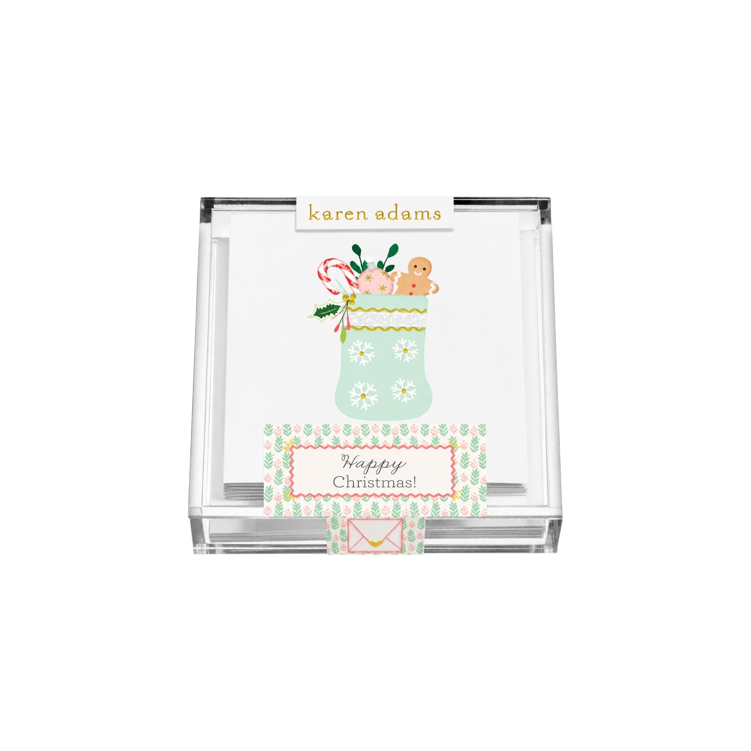 The Tiny Finch hand-glittered Christmas stocking gift enclosure cards in a clear acrylic box with white envelopes.