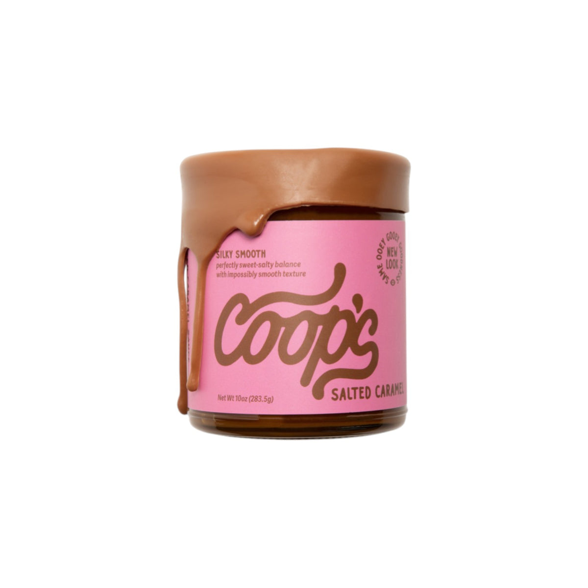 The Tiny Finch Coop's Salted Caramel sauce in a 10 oz jar with caramel dripping down the side and a pink label.