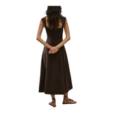 Back view of The Tiny Finch Pallida espresso brown linen midi dress with wide straps and A-line skirt on a model