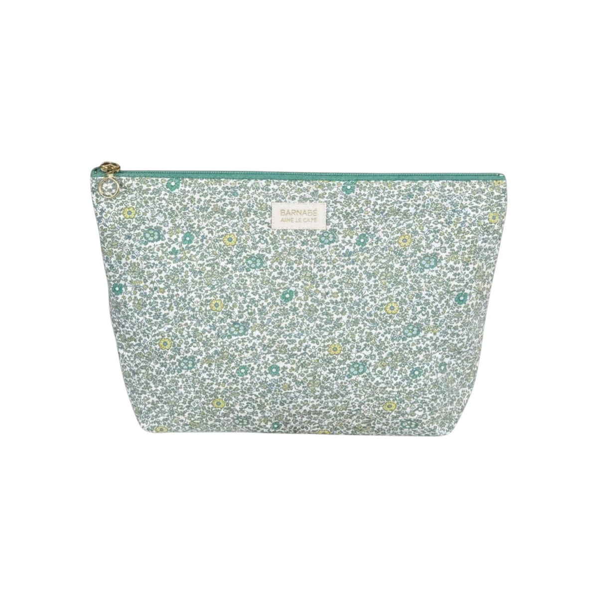 The Tiny Finch Andréa baby toiletry bag in floral Liberty cotton fleece with a green zipper and washable interior.