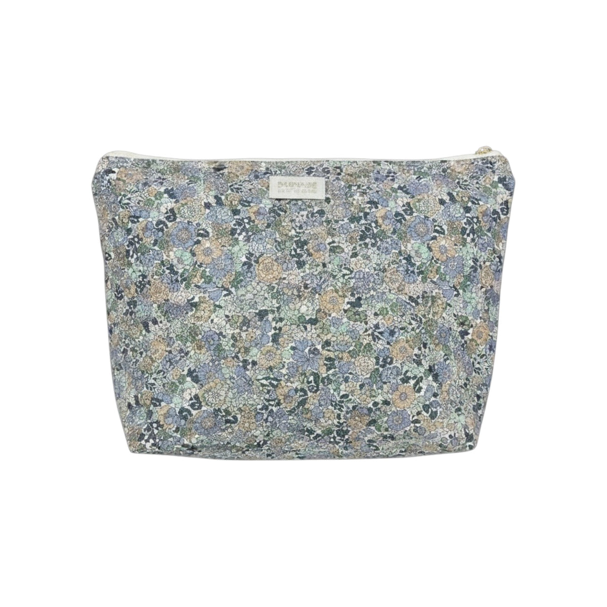 The Tiny Finch baby toiletry bag in floral Liberty cotton fleece with a washable interior and brass zipper detail.