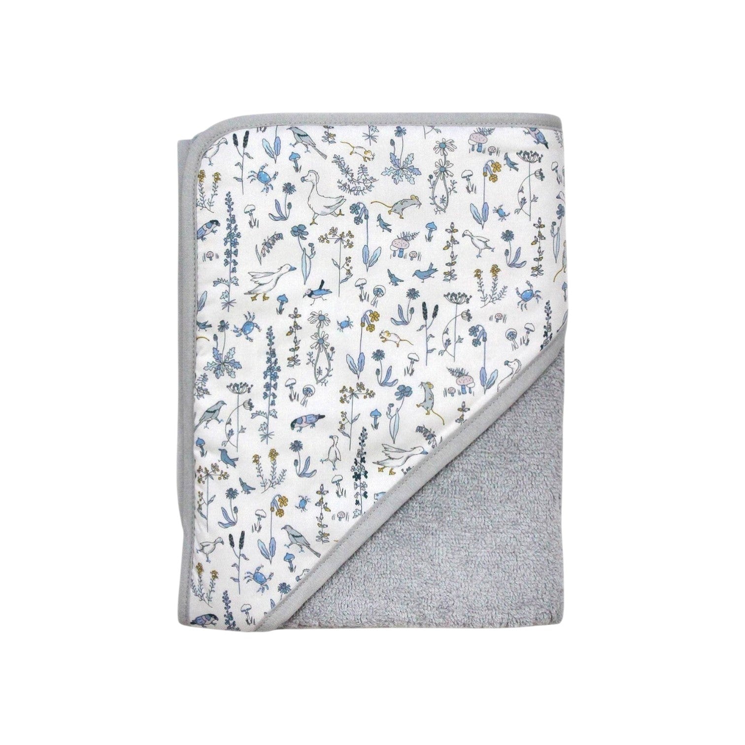 The Tiny Finch Baby Towel Gus featuring a white Liberty floral print and soft grey sponge loop fabric.