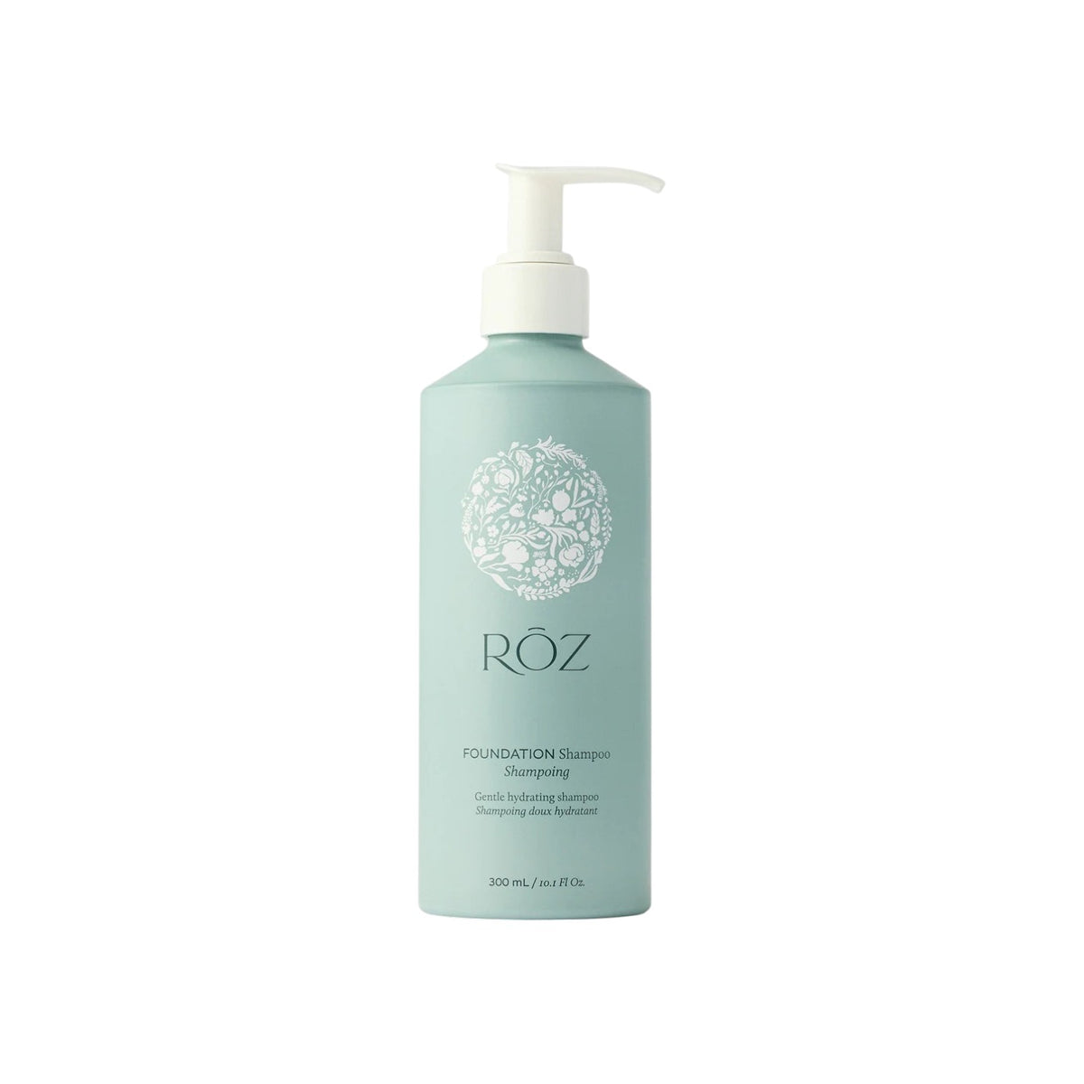 The Tiny Finch Foundation Shampoo in a light green bottle with a white pump dispenser for all hair types.