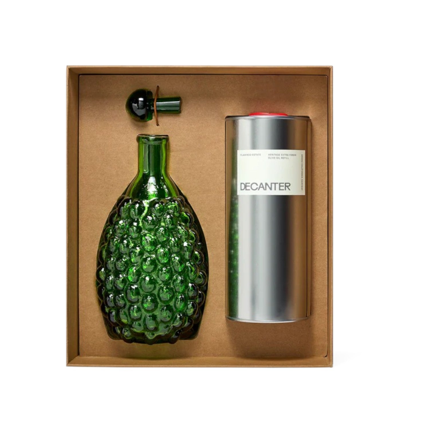 The Tiny Finch limited edition Gaetano Pesce handblown green glass decanter with a tin of Heritage olive oil in a box