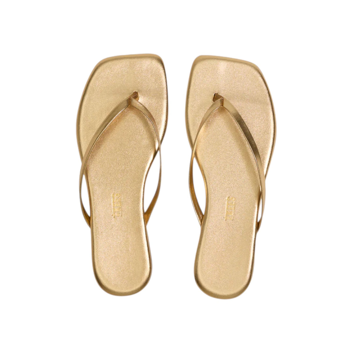 The Tiny Finch Lily square toe thong sandals in metallic gold leather with a minimalist modern design.