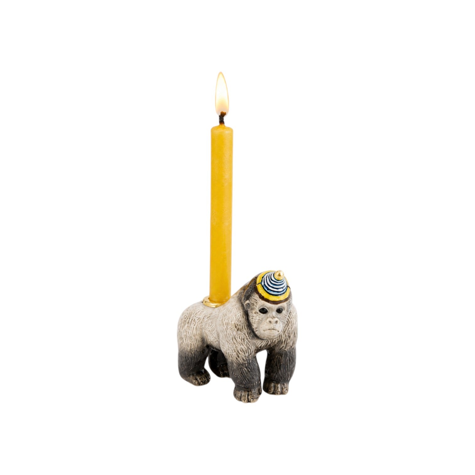 The Tiny Finch gorilla cake topper featuring a grey gorilla wearing a blue and white party hat with a yellow candle.