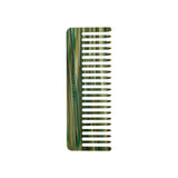 The Tiny Finch wide-tooth hair comb in a green and brown marbled Italian acetate finish on a white background