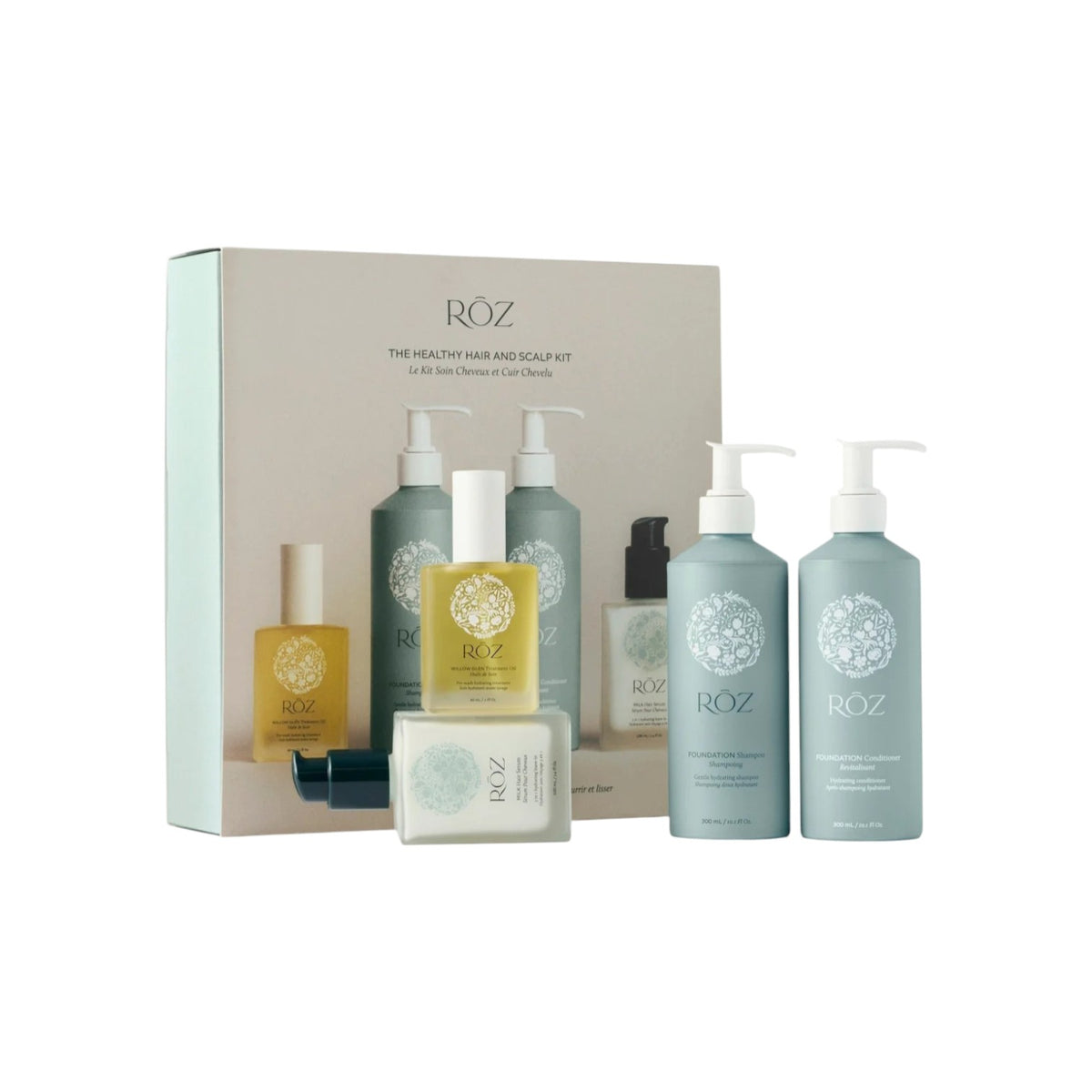 The Tiny Finch Healthy Hair & Scalp Kit featuring ROZ shampoo, conditioner, treatment oil, and milk hair serum.