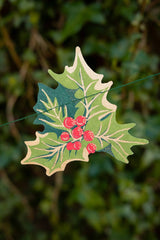 The Tiny Finch hand-screened recycled paper holly and ivy Christmas garland with red berries and green leaves