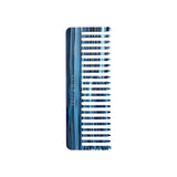 The Tiny Finch wide-tooth hair comb in indigo blue handcrafted Italian acetate with a marbled finish