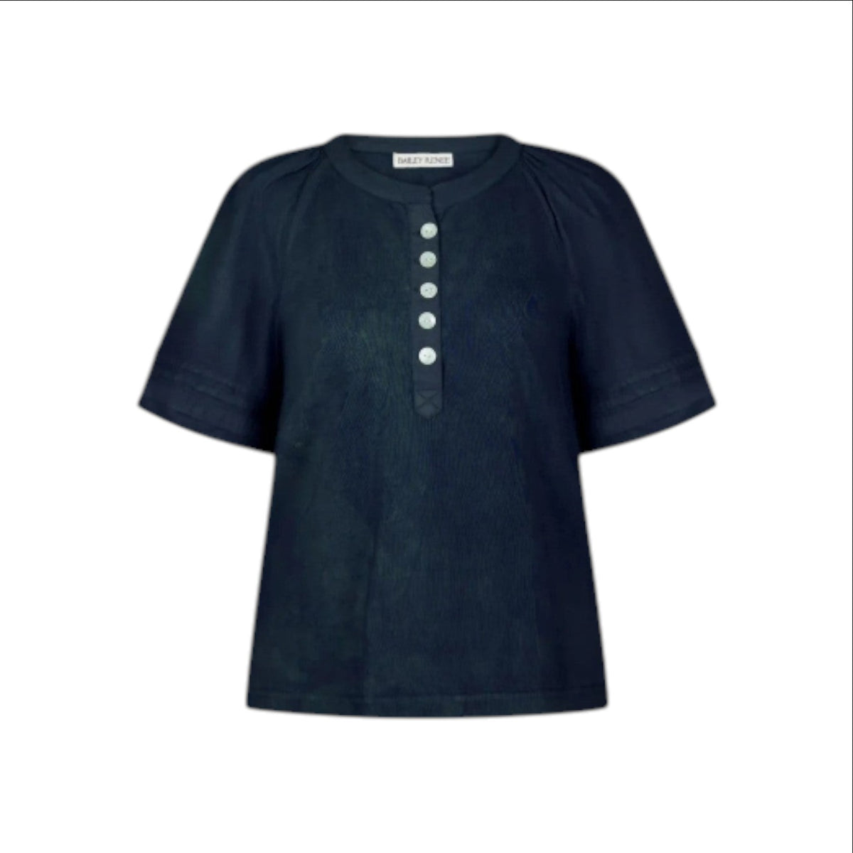 The Tiny Finch indigo henley top with fluttering raglan sleeves, pintuck details, and mother-of-pearl buttons.