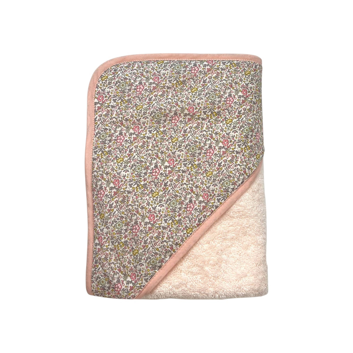 The Tiny Finch Juliette baby bath towel featuring floral Liberty fabric and soft pink sponge loop trim.