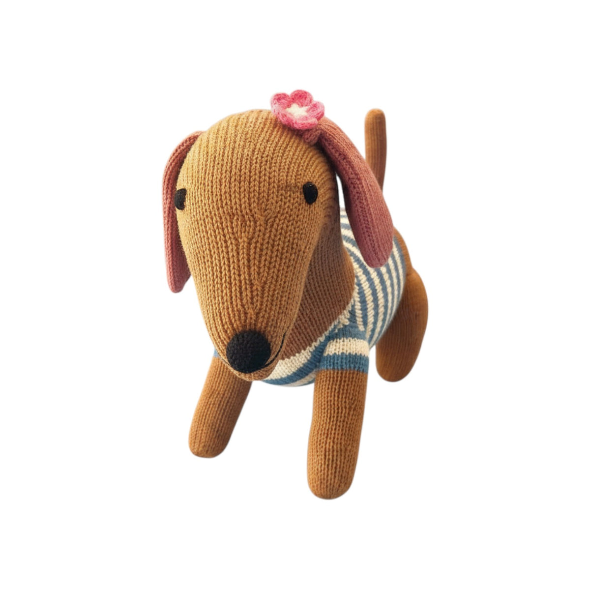 The Tiny Finch knitted dachshund plush toy in brown with a blue striped sweater and a pink cherry blossom on its ear.