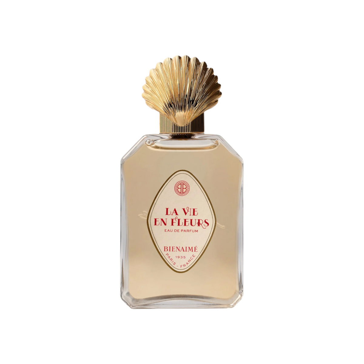 The Tiny Finch La Vie En Fleurs perfume bottle with a gold shell-shaped cap and elegant vintage-style label.