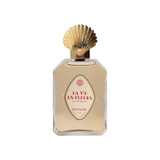 The Tiny Finch La Vie En Fleurs perfume bottle with a gold shell-shaped cap and elegant vintage-style label.