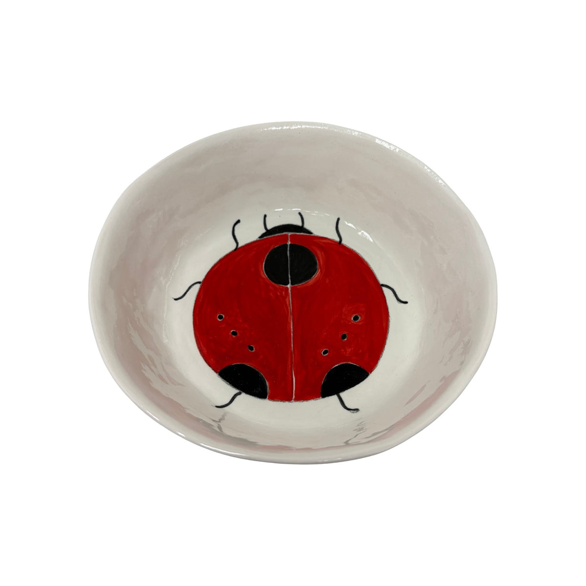 The Tiny Finch large ceramic snack bowl featuring a hand-painted red and black ladybug design on a white background.