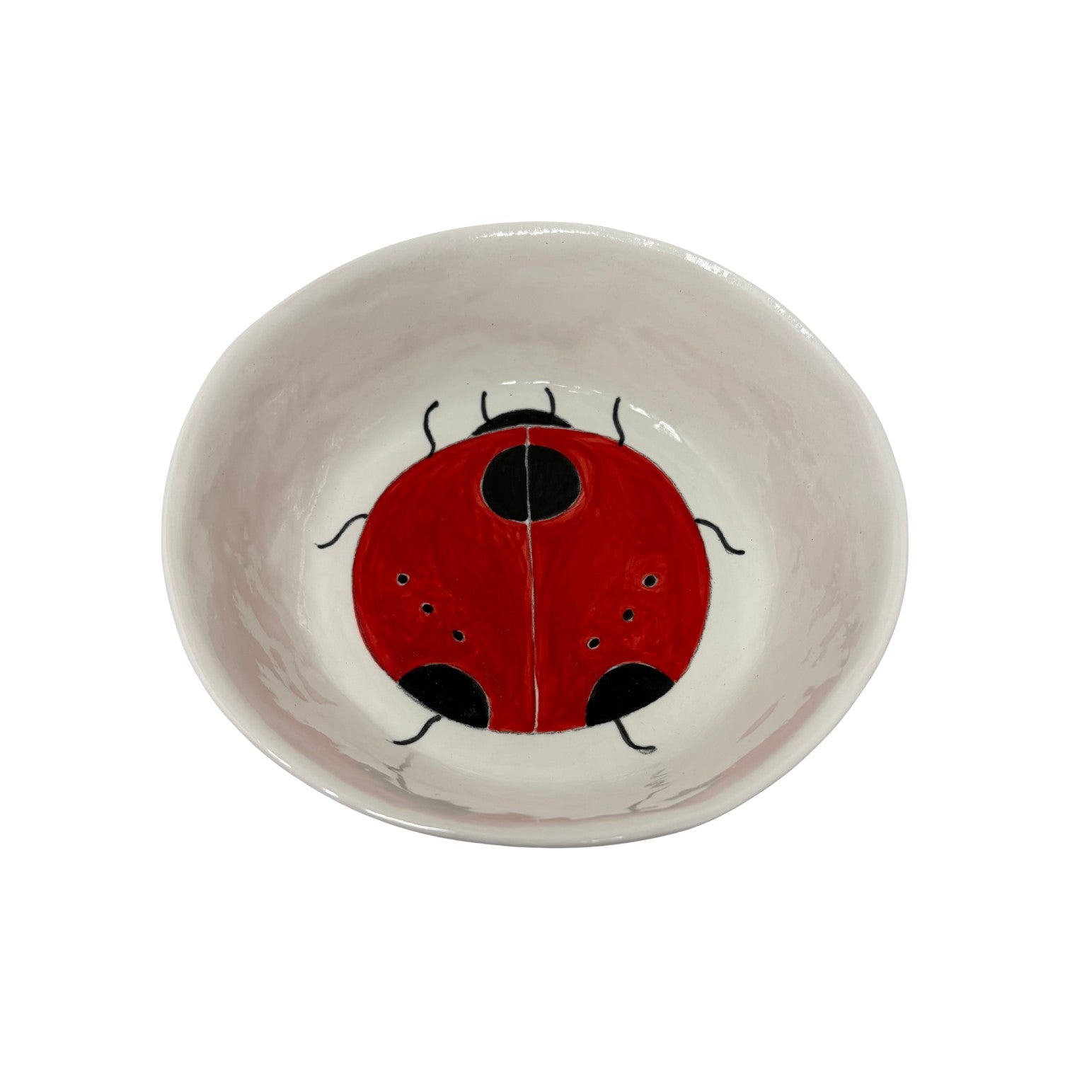 The Tiny Finch large ceramic snack bowl featuring a hand-painted red and black ladybug design on a white background.