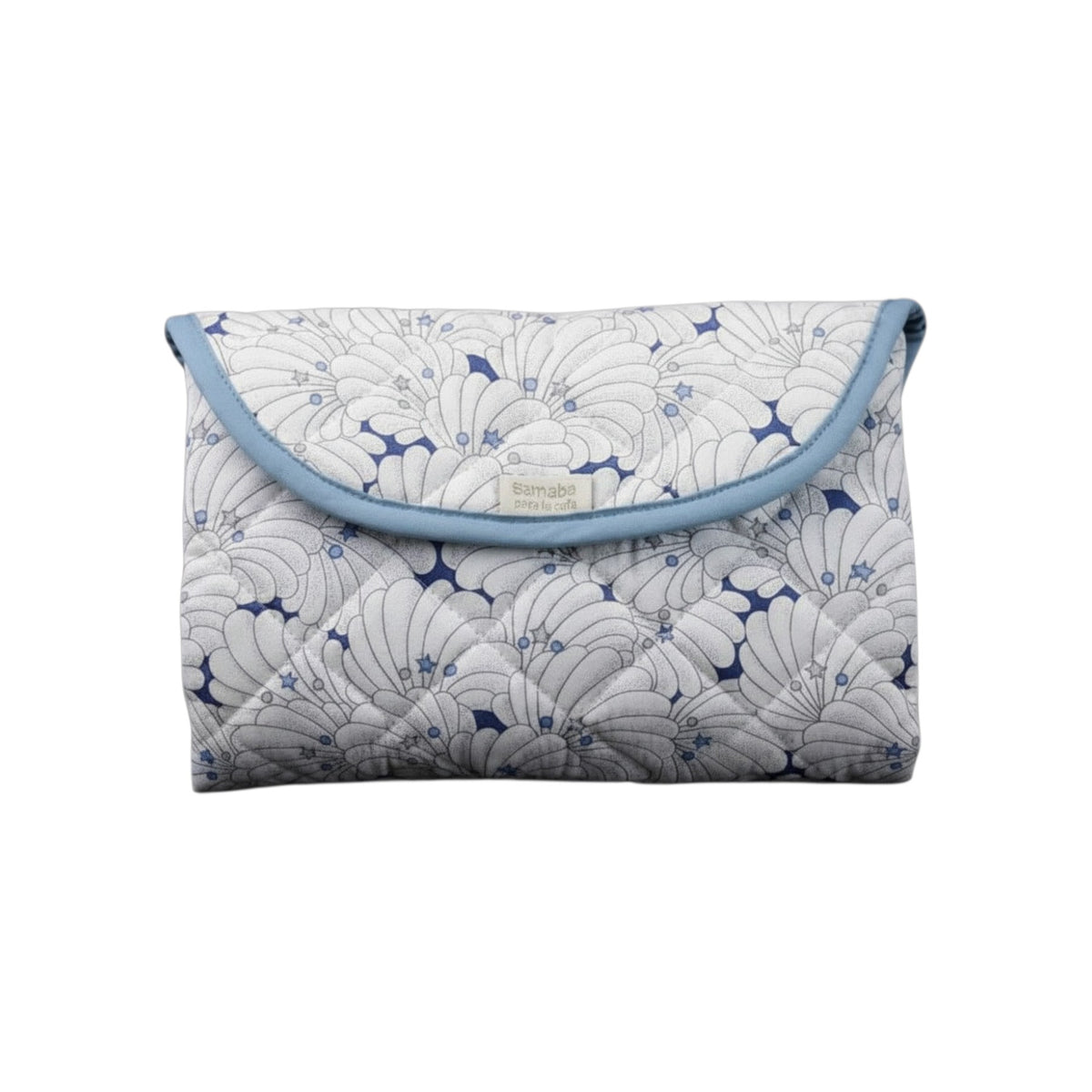 The Tiny Finch Liberty fleece travel changing mat in a white and blue shell print, folded into a compact pouch.
