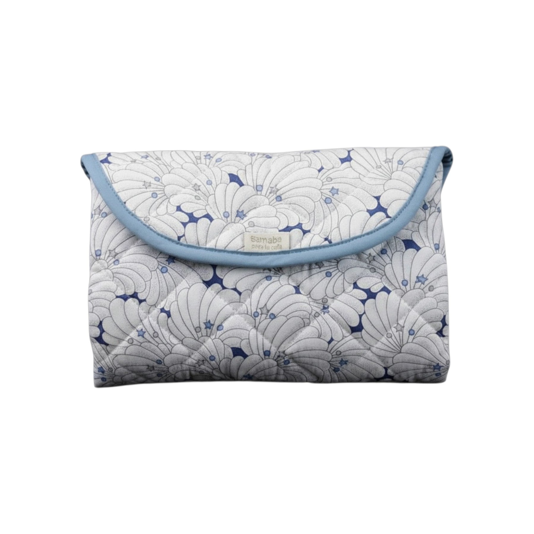 The Tiny Finch Liberty fleece travel changing mat in a white and blue shell print, folded into a compact pouch.