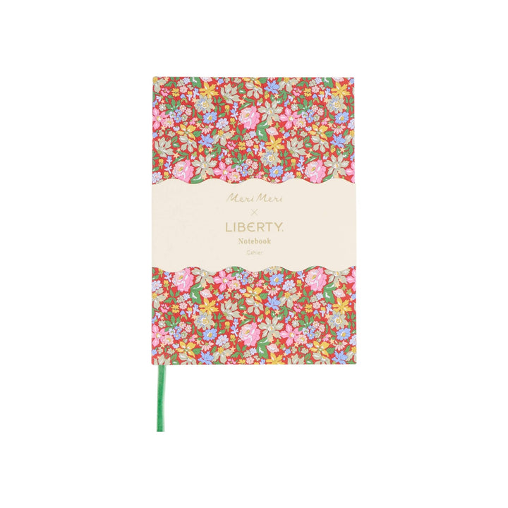 The Tiny Finch Meri Meri x Liberty Julia Star softcover notebook with a vibrant red floral print and green ribbon.