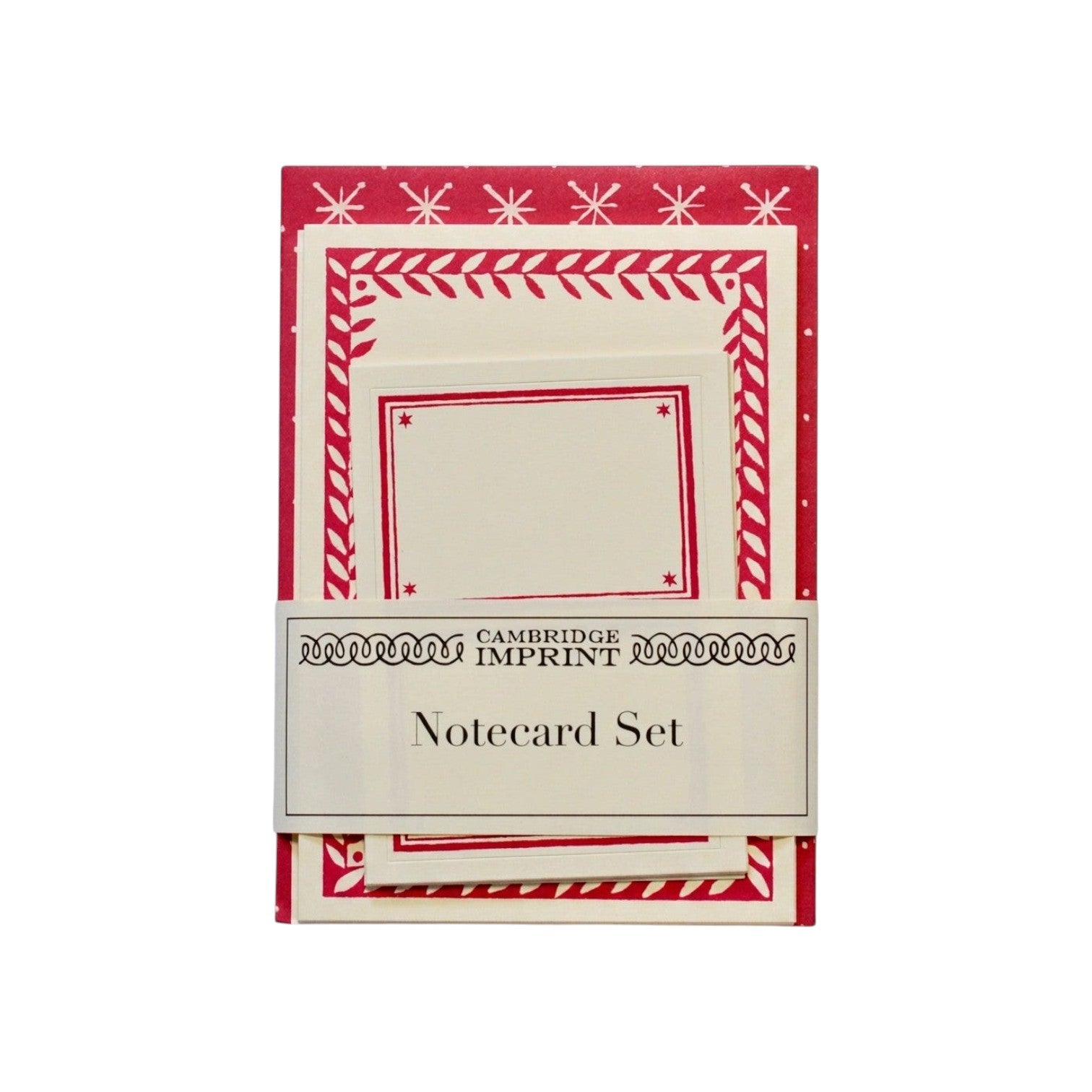 The Tiny Finch magenta notecard set with large star patterns, patterned borders, and coordinating envelopes.