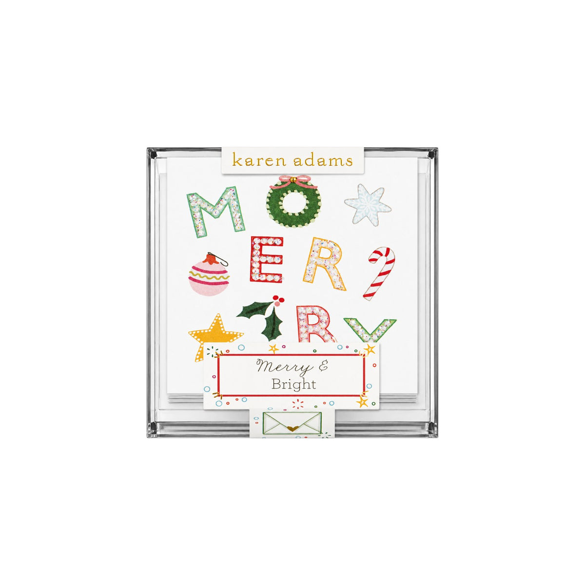 The Tiny Finch Merry holiday gift enclosure cards with hand-glittered festive icons in a clear acrylic box.