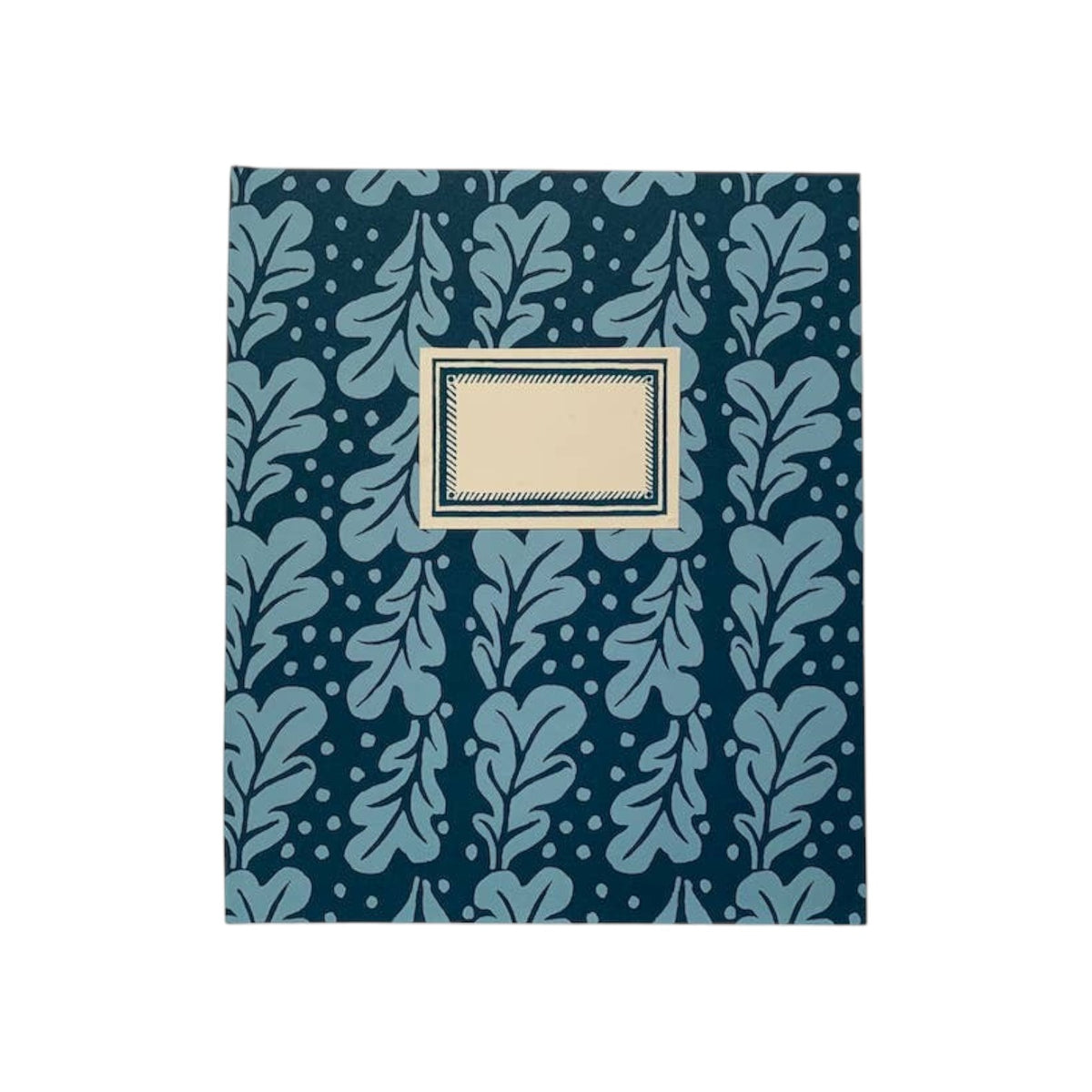 The Tiny Finch large hardback notebook in midnight blue with a patterned oak leaf design and cream front label.