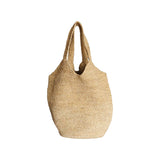 The Tiny Finch Bembien Playa Tote in natural raffia, a large unlined beach carryall with a structured leather base.