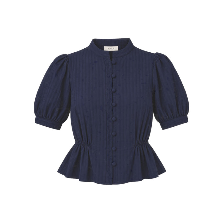 The Tiny Finch navy cotton blouse with puff sleeves, pintuck details, band collar, and covered button front.
