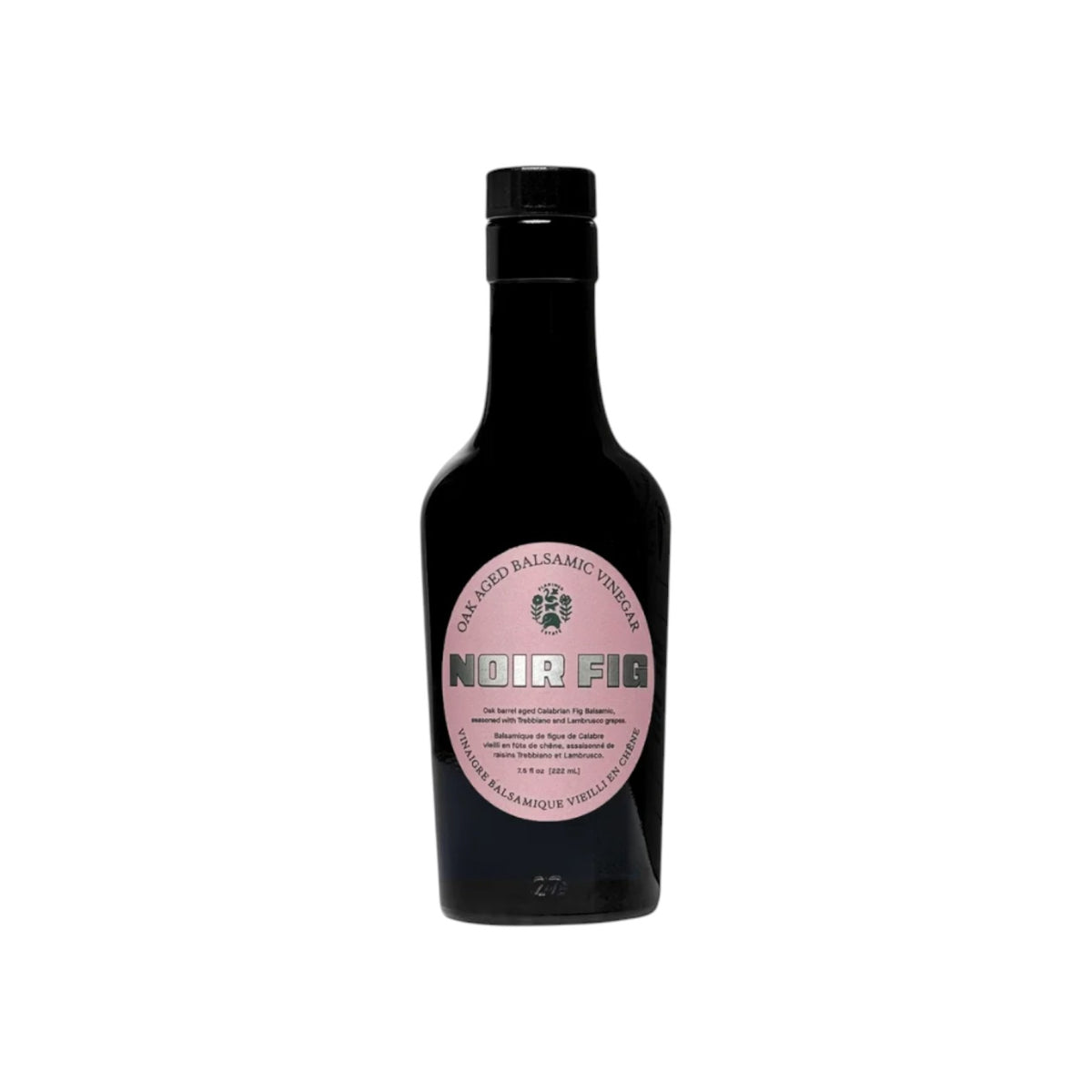 The Tiny Finch Noir Fig Balsamic vinegar in a dark glass bottle with a round pink label and black cap.