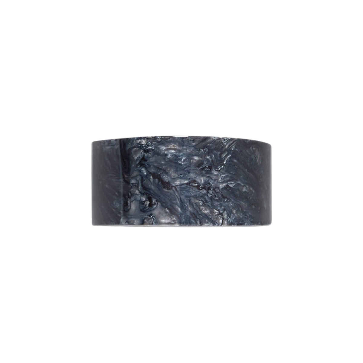 The Tiny Finch French Pony barrette in obsidian black marbled Italian acetate with a stainless steel clasp.