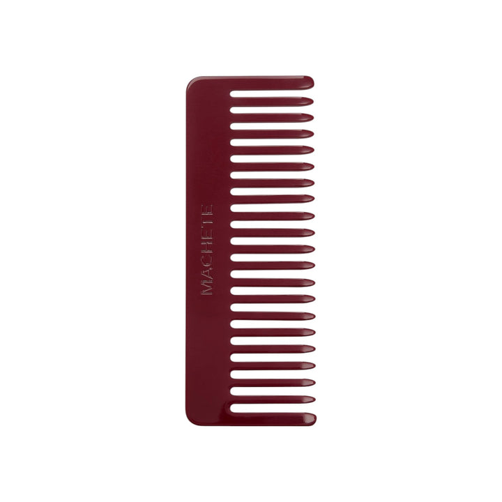The Tiny Finch oxblood wide-tooth hair comb handcrafted from Italian acetate for all hair types