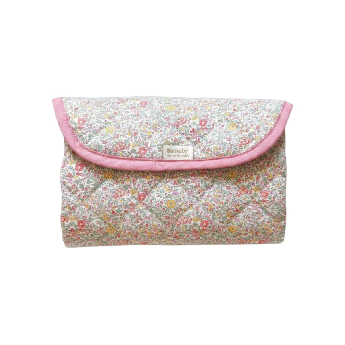 The Tiny Finch Paloma floral print quilted baby changing mat folded into a compact pouch with pink trim