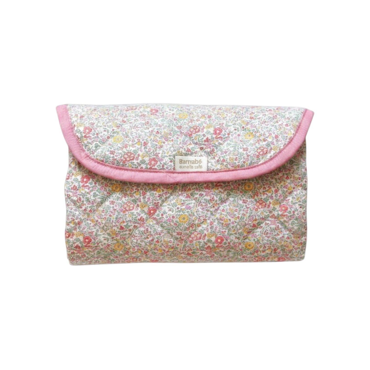 The Tiny Finch Paloma floral print quilted baby changing mat folded into a compact pouch with pink trim