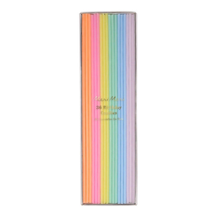 The Tiny Finch pack of 36 long skinny pastel birthday candles in lilac, pink, blue, mint, yellow, and neon orange.