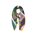 The Tiny Finch Petra scarf in 100% wool featuring a bold geometric pattern in green, blue, and earthy tones.