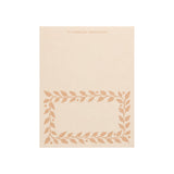 The Tiny Finch pack of twelve cream place cards with a decorative pink leaf border pattern on heavy cardstock.