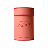 The Tiny Finch La Vie En Fleurs perfume in a cylindrical pink box with red lettering and trim.