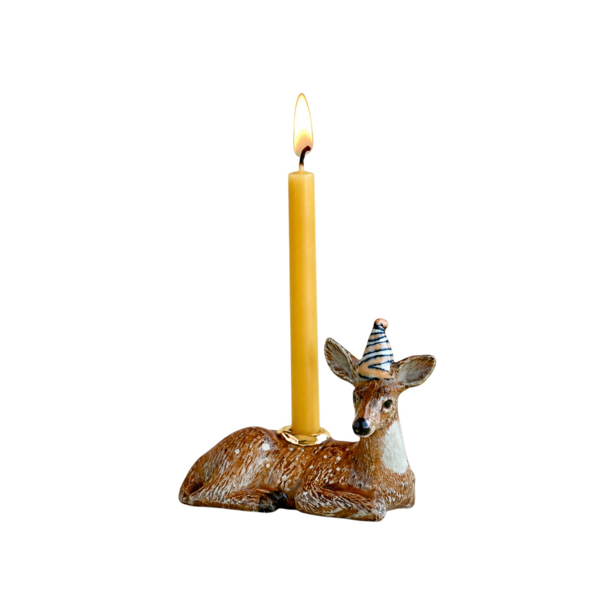 The Tiny Finch porcelain deer cake topper with a yellow and blue striped party hat and gold candle holder